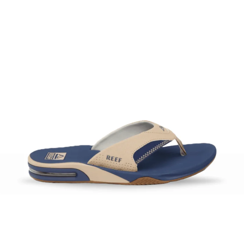 Men's sandals with a rubber sole for tractionReef Men's Fanning Flip Flops - Tan/Navy/Tan